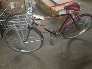 Vintage Roadmaster bike with a bask...