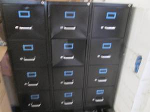 3 Metal 4 drawer file cabinets, one...