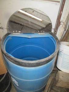 Plastic drum with hinges metal lid...