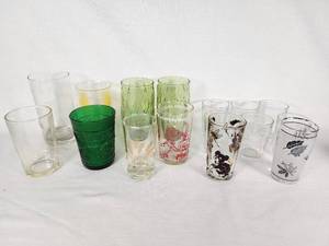 Vintage Decorative Glassware Including Flintstones and Animal Designs, Green Patterned Glasses, and Clear Glass Sets