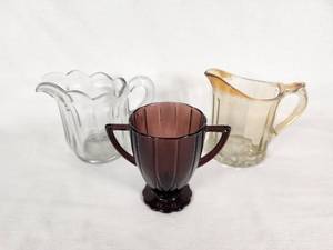 Glass Creamers and Sugar Bowl