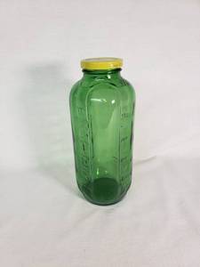 Green Glass Jar with Yellow Lid That Says Water