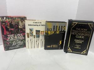 4 Books The Love You Make Story of the Beatles, A Guide to Understanding Painting, Back Roads by ODell and The More Thans Complete Hitchhikers Guide by Adams