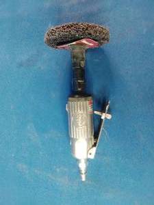 Mac Tools straight air die grinder, often used for grinding, polishing, or deburring.