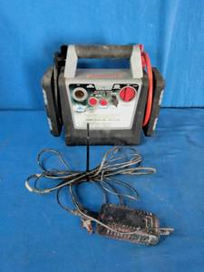Peak PKC0AS Portable Power System 300, featuring a grey and black housing with a top handle.