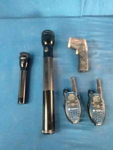 Two Maglite flashlights, two Motorola walkie-talkies, and one infrared thermometer