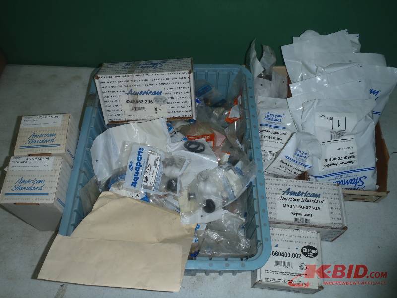 lot 309 image: Box of American Standard, Zurn, Chicago Faucets, Etc. Parts