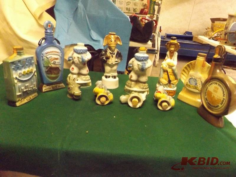 lot 16 image: 11 Jim Beam Character Bottles