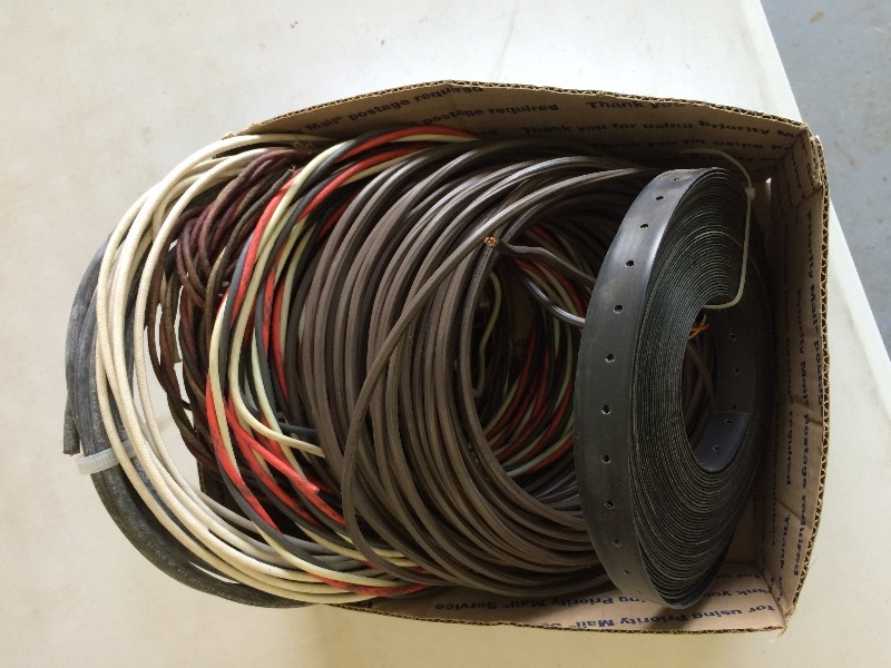 lot 17 image: Assorted Lot of thermostat wire, plumbers strap, ignition wire and misc wire