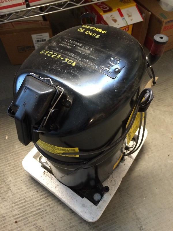 lot 58 image: Halted at Affiliates Request - Bristo Compressor  3 ton AC (36,000 btus), R-22, 208230 volts, single phase. New - Never used  sealed