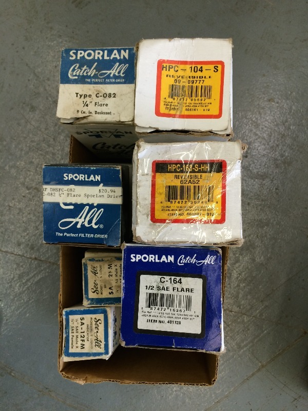 lot 61 image: Filter Driers & sight glass  New in the box  Sealed  Lot of 7