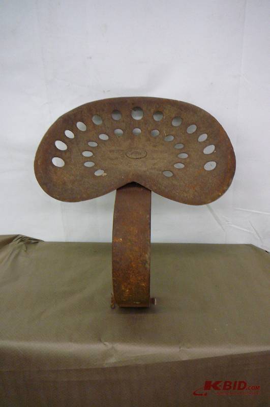 lot 90 image: Antique Tractor Seat
