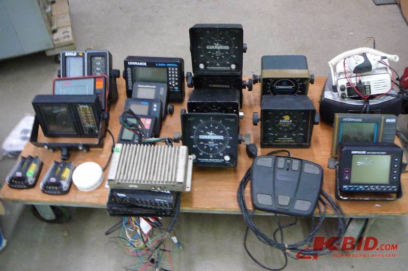 lot 165 image: Lot of Electronics -Eagle -Lowrance - Si _Tex - Microna - Bottom line  -Humming bird -Eagle -Interphase -Impulse - Sony -Eclipse -Targa -Moror guide control  -Cables - Transducers -Antennas -Mounts -Cash Register - Card Machine
