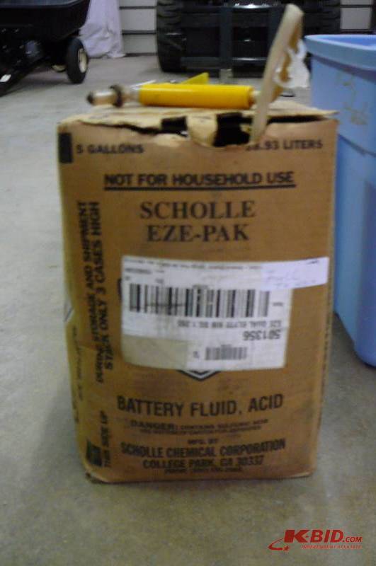 lot 213 image: Battery Acid 3 gal Box