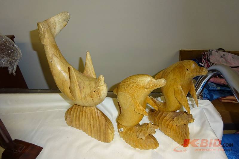 3 wooden Dolphins