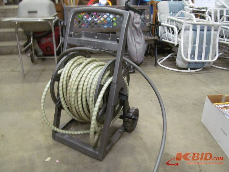 lot 120 image: Hose reel and hose