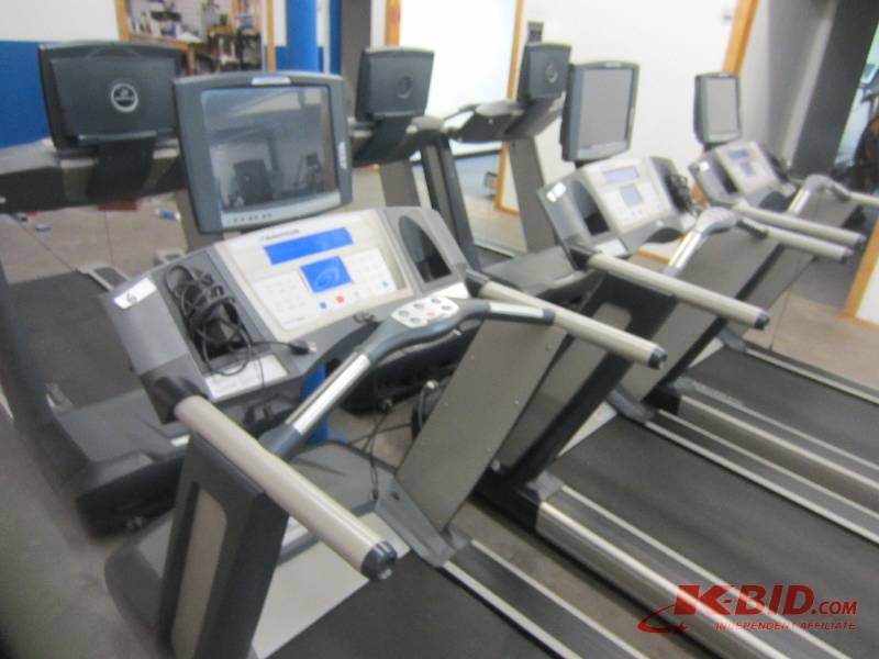 lot 13 image: Nautilus T916 Commercial Treadmill.  With matching TV add on.