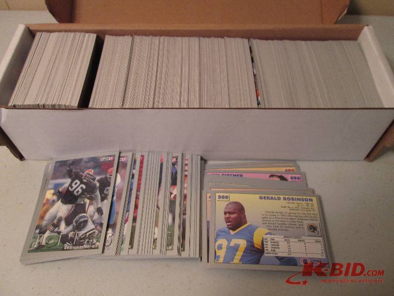 lot 24 image: Box of 1993 Fleer football cards...