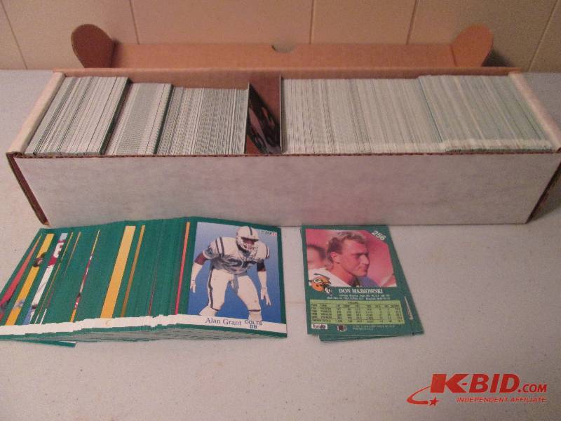 lot 45 image: Box of 1991 Fleer football cards...