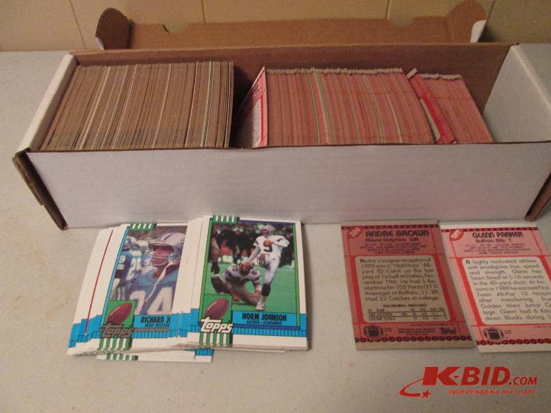 lot 46 image: Box of 1990 Topps football cards...