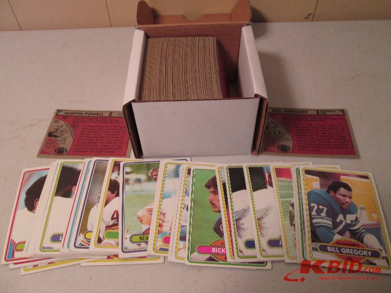 lot 114 image: Box of 1980 Topps football cards...