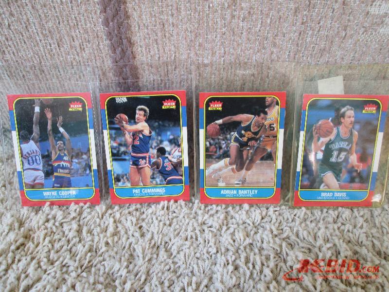 lot 13 image: 4 1986 - 1987 Fleer basketball card...