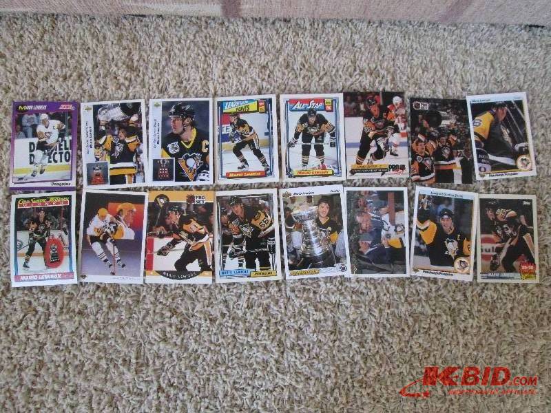 lot 52 image: 16 Mario Lemieux cards...