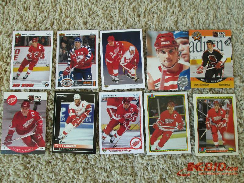lot 53 image: 10 Steve Yzerman sports cards...