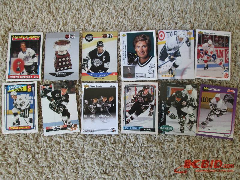 lot 57 image: 12 Wayne Gretzky sports cards...