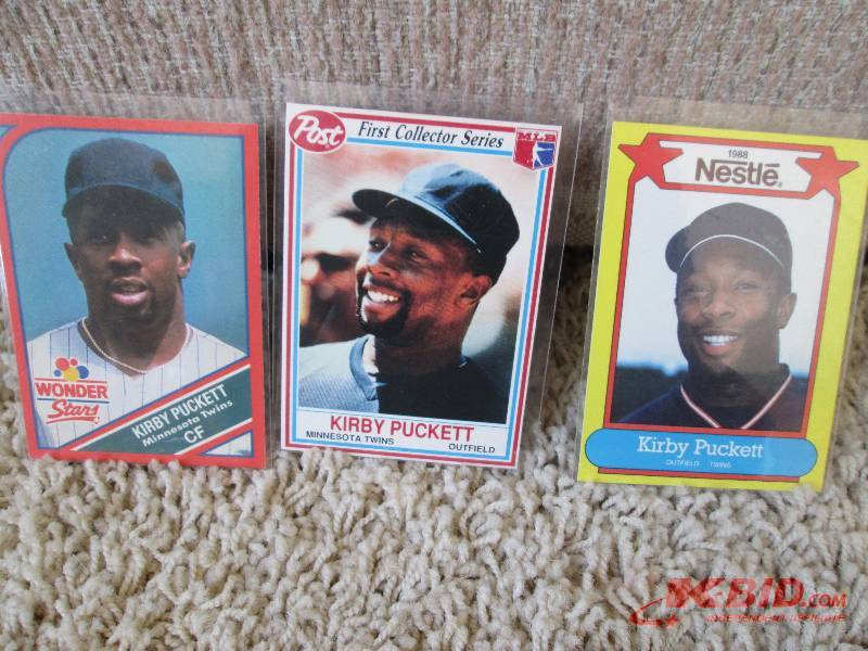 lot 79 image: 3 Kirby Puckett cards...