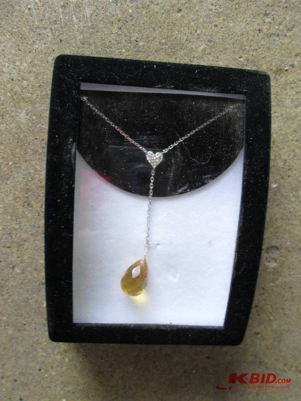 lot 49 image: Brand new necklace in amber...