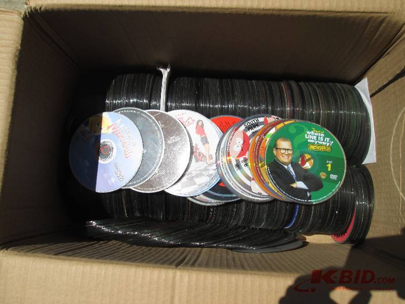 lot 57 image: HUGE lot of assorted CDs and DVDs, ...