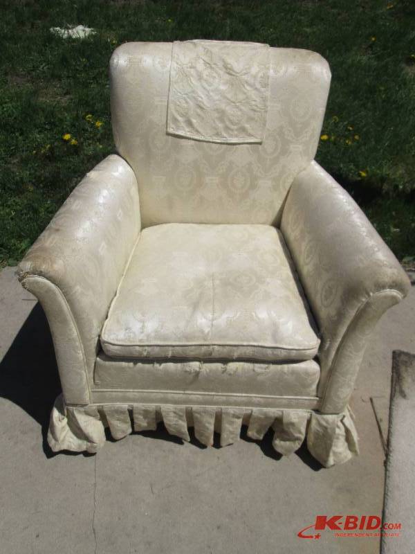 lot 70 image: Vintage cream colored chair on whee...
