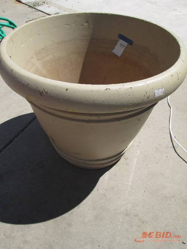 lot 77 image: Large foam planter, measures 21 ac...