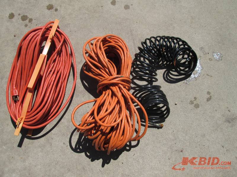 lot 78 image: 2 extension cords and an air hose...