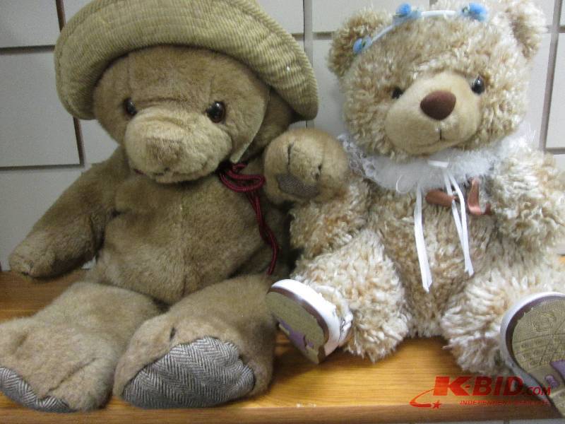 lot 212 image: two bears, one with hat, the other ...
