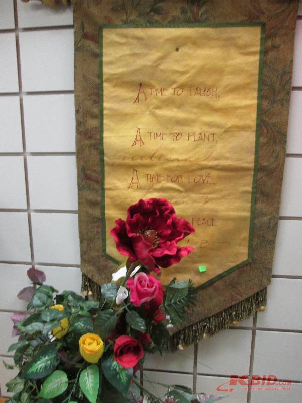 lot 228 image: roses and greenery and wall hanging...