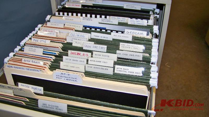 lot 68 image: 2-Drawer File Cabinet filled with product manuals  brochures  spec sheets