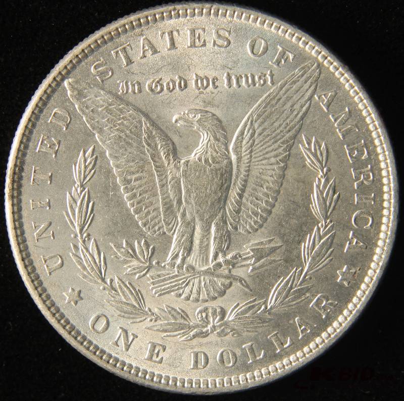 1886 MORGAN SILVER DOLLAR AU