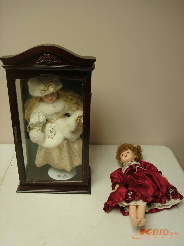 Pair Of Porcelain Dolls