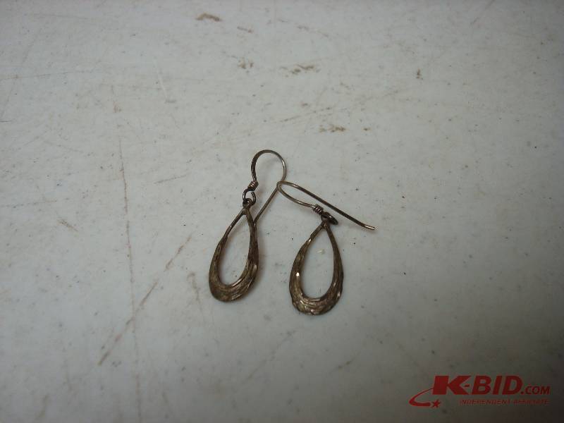 Pair Of Silver Earrings
