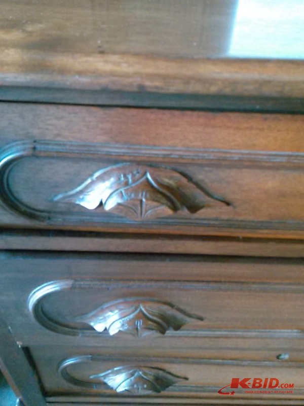 lot 18 image: STUNNING ANTIQUE DRESSER WITH ORNATE HAND CARVED ACCENTS AND DRAWER PULLS