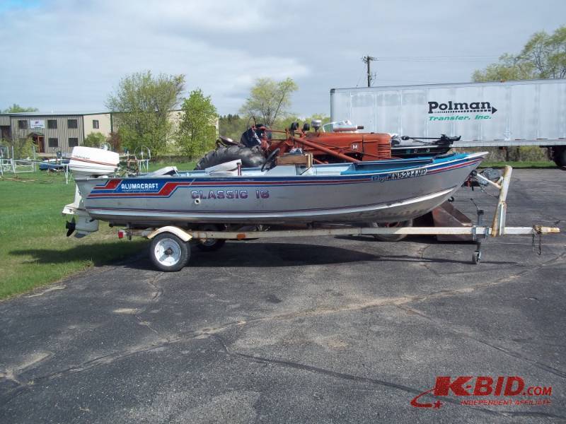 lot 16 image: 16 Alumacraft Aluminum Fishing Boat and Trailer and 50 HP Johnson Motor