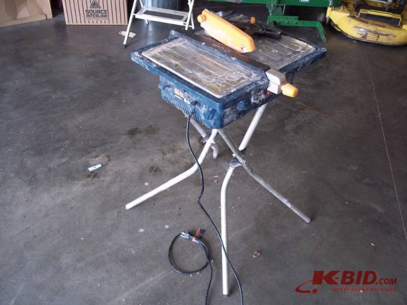 lot 51 image: Ryobi Tile saw with stand tested and works