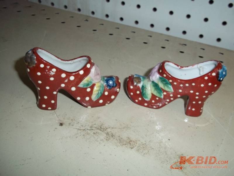 lot 98 image: Pair of ceramic shoe dcor