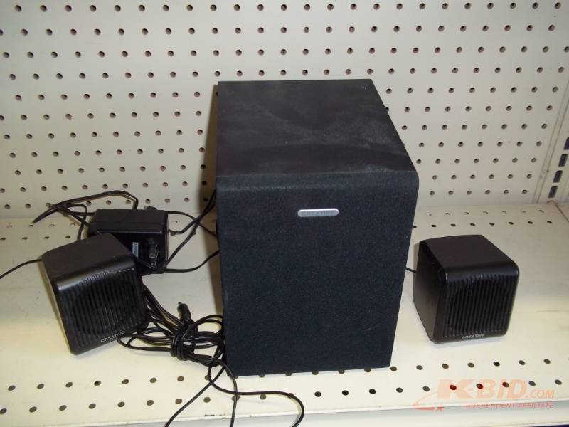 lot 135 image: Speakers with cords and power unit
