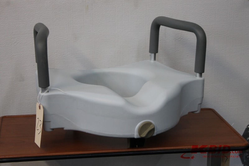 lot 23 image: Locking Elevated Toilet Seats with Arms and Microban