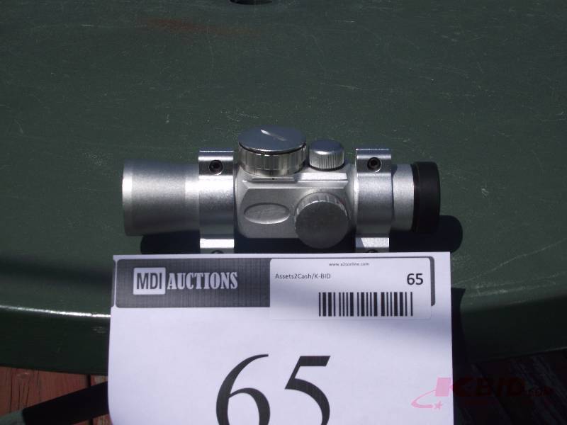 lot 65 image: Red dot sight with 5 different dot sizes and rings