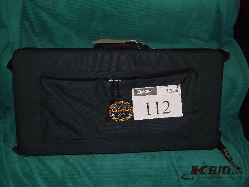 lot 112 image: Cabellas travel case holds 8 assorted reels