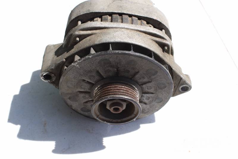 lot 14 image: Delco Remy Alternator.